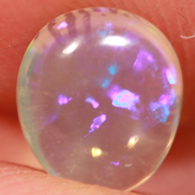 SOLID CRYSTAL OPAL Transparent with rich purple sparkles